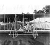 Kingsland Coffyn (right) and an unknown child posing in a Wright aircraft.