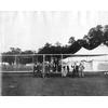 Frank Coffyn (center, at the controls), Duval La Chapelle, and unidentified men posing on a Wright aircraft.