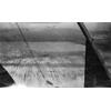 Aerial photograph taken from Wright Model B over what appears to be snow-covered plowed ground.