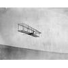 Wilbur Wright flying the 1902 glider, Kitty Hawk, North Carolina.