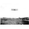 Wright pilot and passenger in flight at exhibition�possibly Arch Hoxsey and Theodore Roosevelt.