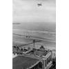 Walter Brookins diving toward the surf in a Wright transitional aircraft, Atlantic City, New Jersey.