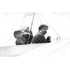 Postcard of Count Jacques de Lesseps and women passengers aboard a Bleriot aircraft.