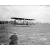 Frank Coffyn taking off or landing in a Wright Model B.