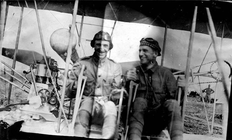 Frank Coffyn (right) and military passenger posing in a Model B.