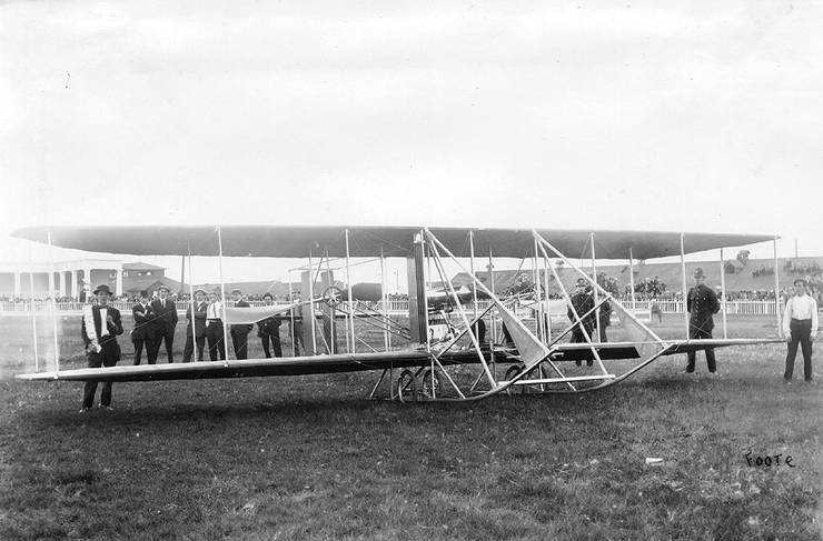 Early Wright Model B at an exhibition surrounded by police and attendants.