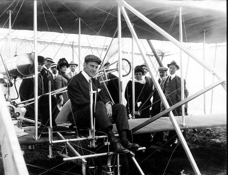 Frank Coffyn posing on an early Wright Model B.