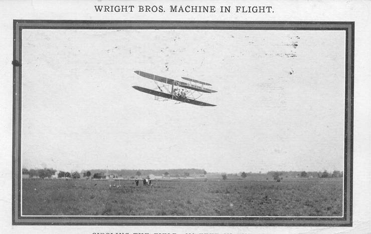 Postcard of Wright transitional aircraft in flight.