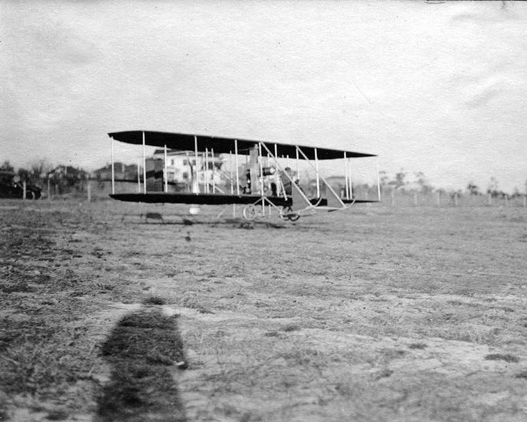 Frank Coffyn taking off or landing in a Wright Model B.