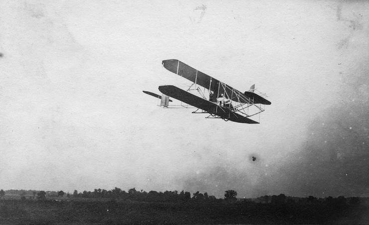 The single-plane transitional aircraft in flight.