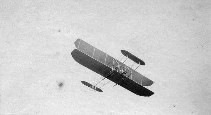 The single-plane transitional aircraft in flight.
