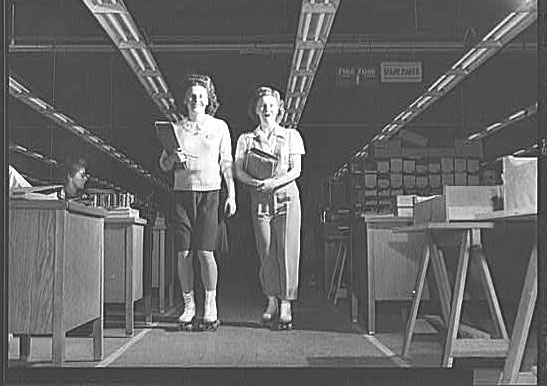 Girls on roller skates at Douglas Aircraft