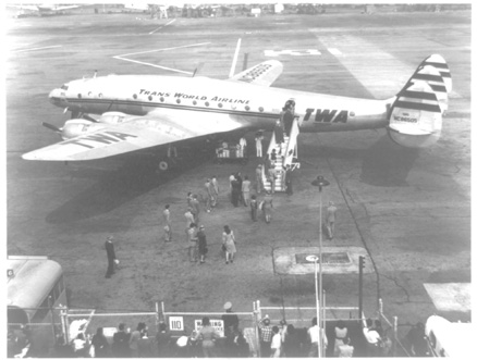Passengers boarding a TWA Constellation