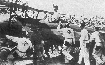 Louise Thaden being congratulated for her first-place finish in the 1929 Womens Air Derby, an event at the National Air Races.