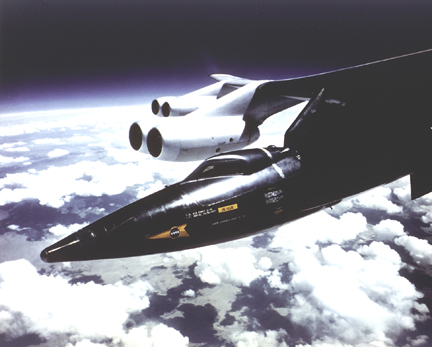 X-15 mounted to B-52 mothership pylon in flight
