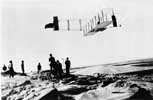 Orville Wright making a record gliding flight of 9-3/4 minutes on October 
24, 1911, at Kitty Hawk