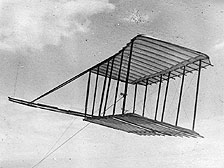 Wilbur Wright in the 1903 Flyer