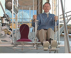 man sitting in pilot's seat